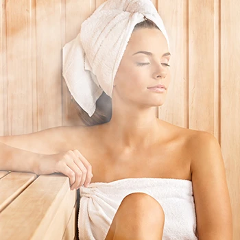 A woman in relaxing in Sauna