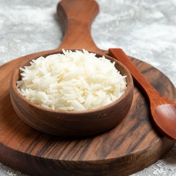 A rice in a wooden circular bowl