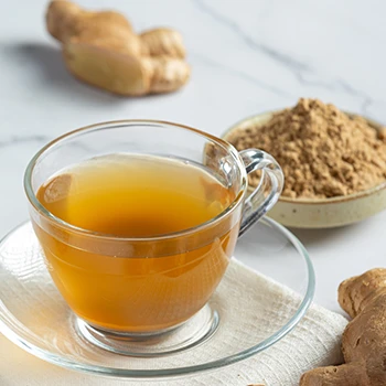 Ginger tea in a glass mug