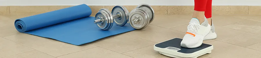 A yoga mat with light dumb bells