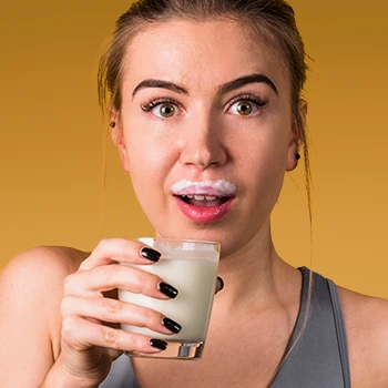 A woman with a milk mark on her mouth