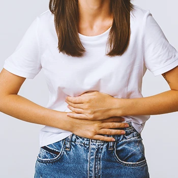 A person holding her stomach