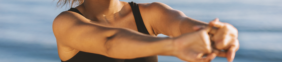 a woman stretching her arms