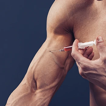 Injecting syringe with steroids inside biceps