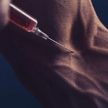 Close up image of using a steroid in veins