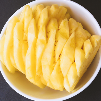 Close up shot of sliced pineapples