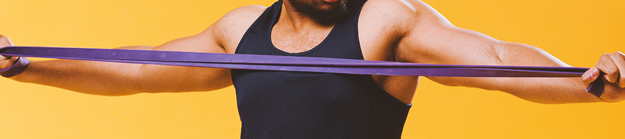 A person using a resistance band to stretch his arm