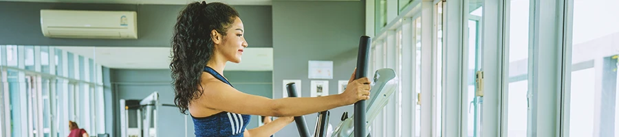 A woman doing cardio in the gym