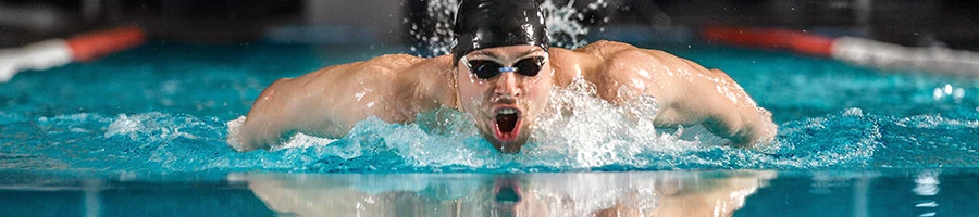 A shot of a person practicing to swim