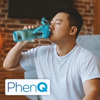 A person drinking with the PhenQ logo