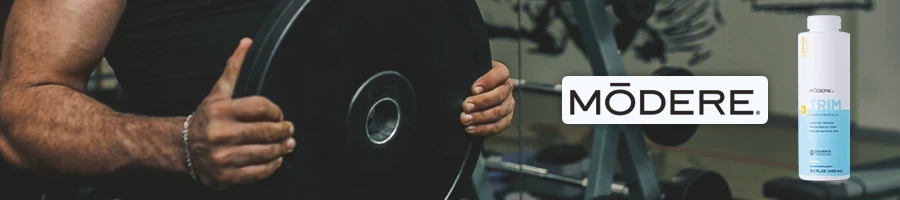 A person holding weights with Modere Trim on the side