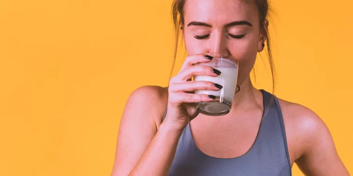 A woman drinking a healthy shake