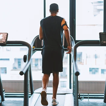 A person doing cardio on a tread mill