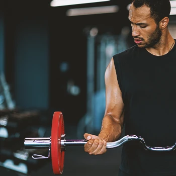 A person in the gym lifting weights