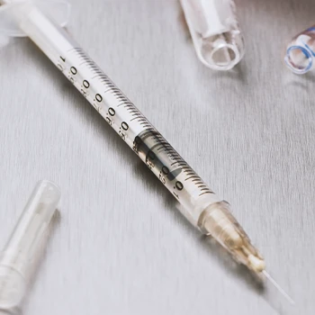 Close up shot of a syringe of steroids