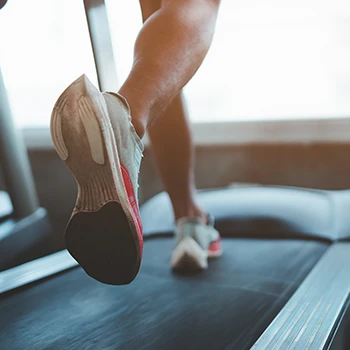 Man running on a treadmill