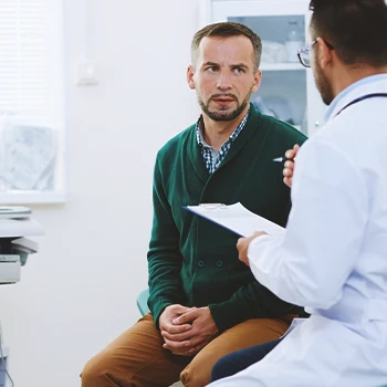 A doctor talking to a patient