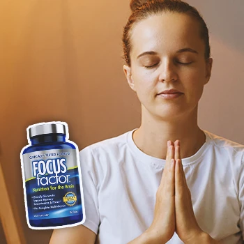 Focus Factor with a person doing yoga in the background