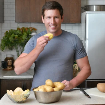 Man eating potatoes