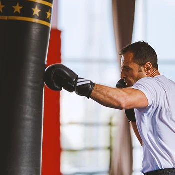 A person punching a punch bag