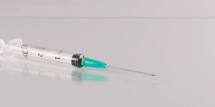 A syringe on a table