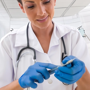 A doctor holding a syringe