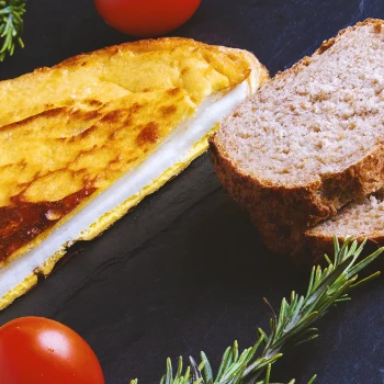 Close of shot of whole grain bread and scrambled eggs