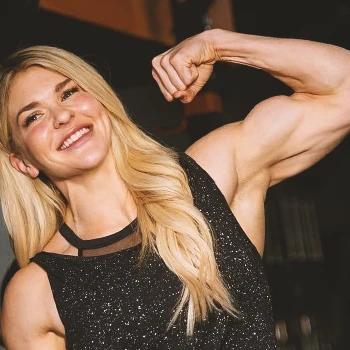 Brooke Ence with steroid-like muscles flexing to the camera