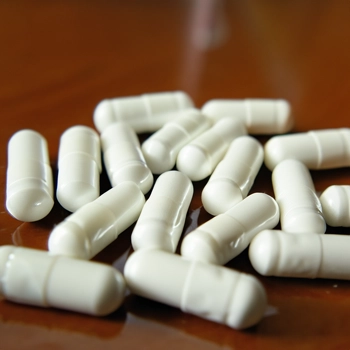 Close up image of white capsules