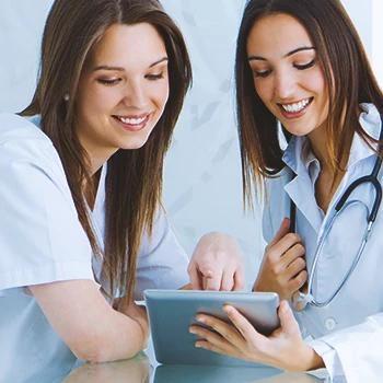 A female doctor and patient discussing with each other