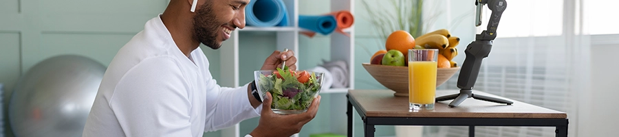 A man having a healthy lifestyle in his room