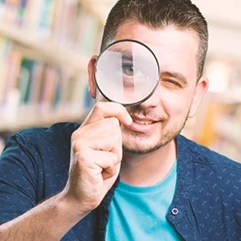 Man using magnifying glass