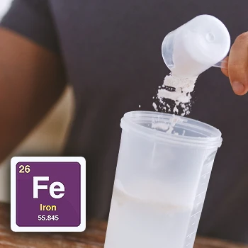 Iron graphic symbol with a person pouring protein powder into a bottle in the background