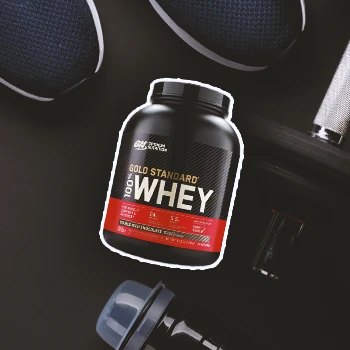Optimum Nutrition Gold Standard with gym equipment in the background