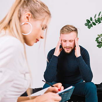 A depressed man consulting a doctor