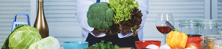 A male over 30 years old holding healthy foods for weight loss