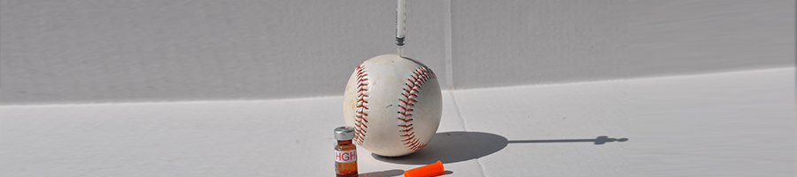 Injected syringe on top of ball