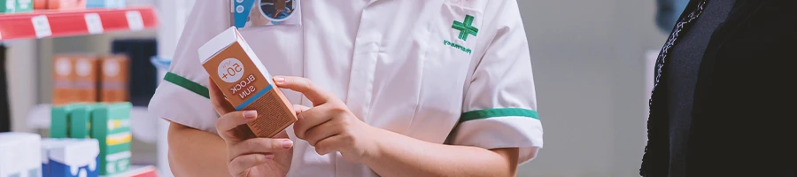 A nurse comparing the ingredients of nootropic pills