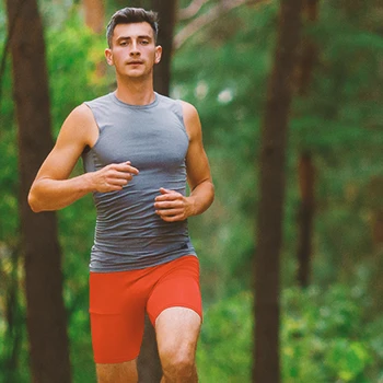 A runner jogging outside to boost testosterone levels