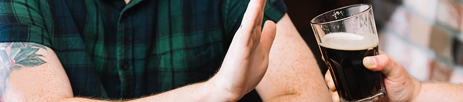 Man refusing to drink alcohol because it lowers testosterone