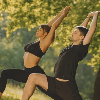 A couple doing yoga with the help of TruBrain nootropic supplements