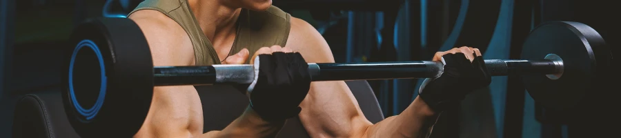 A man choosing his gym equipment