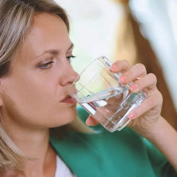 A person drinking Quantumind at home