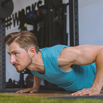 A man working out at a home gym