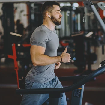 A man working out in a commercial gym