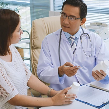 A doctor explaining nootropics dosages to a patient