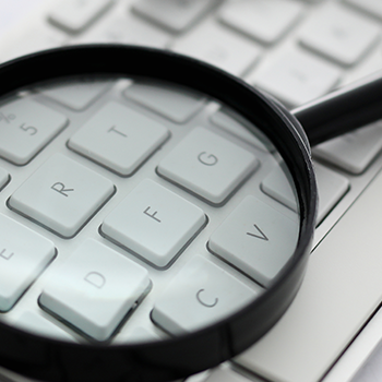 Magnifying glass above the keyboard