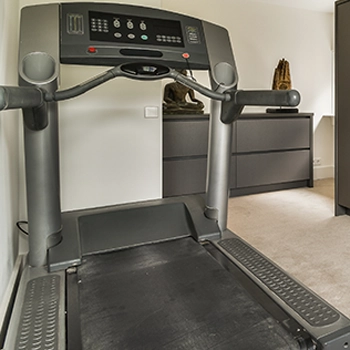 A treadmill inside a tight room