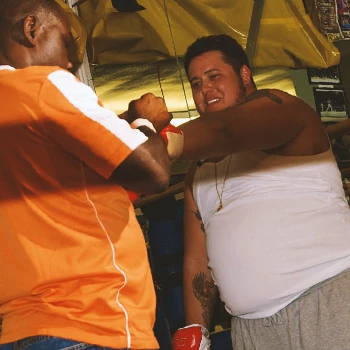 Chaz Bono doing martial arts inside the gym