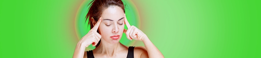 A woman thinking with light behind her head